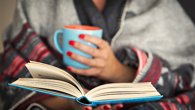 If you're making a list of books to enjoy this fall when curling up with a good book, we've got a few suggestions. Closeup photo of a woman reading a book