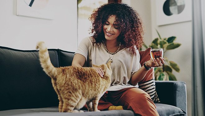 Woman with ginger cat