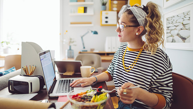 Image of a woman working from home