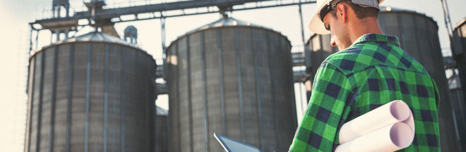 Worker at plant with laptop Worker at plant with laptop