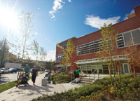 Community centre building with sky and lens flare Community centre building with sky and lens flare