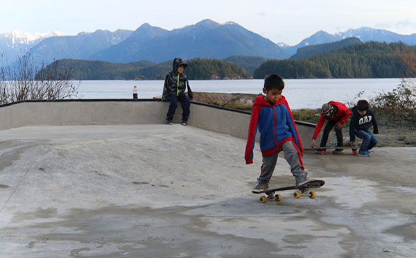 Kids skateboarding at the skate park in Ahousaht Kids skateboarding at the skate park in Ahousaht