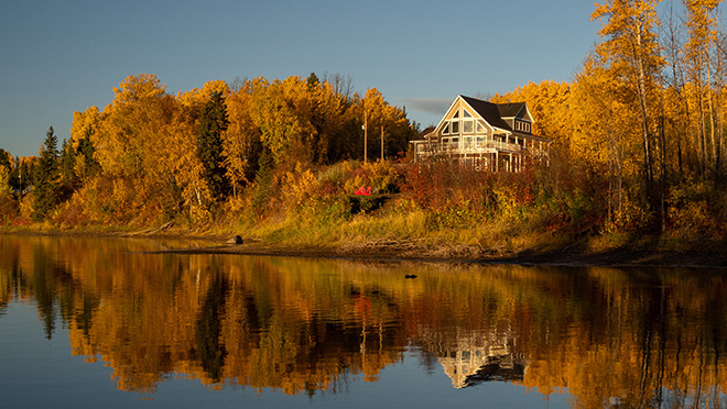 View of a Net Zero Ready home in Fort St. James, B.C. from the Stuart River