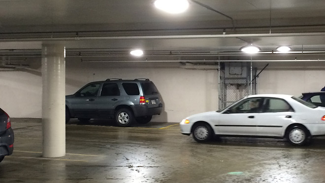 Image of the Mayfair Shopping Centre parking lot using new LED lighting New LED lighting helps save money and offers brighter, clearer light.
