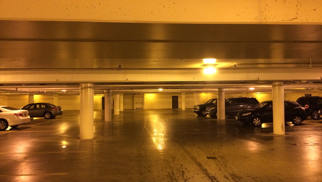 Image of Mayfair Shopping Centre parking lot with old pressure sodium lighting Before the upgrade, the parkade at Mayfair Shopping Centre was lit with older-style high pressure sodium lighting.