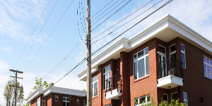 Powerlines and poles near residential buildings