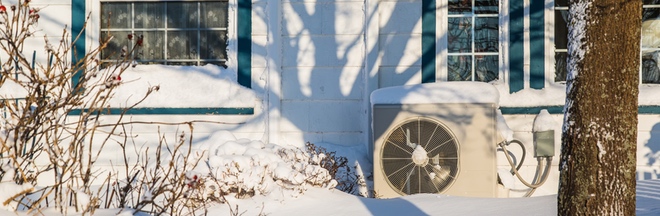 Snowy home exterior heat pump Snowy home exterior heat pump