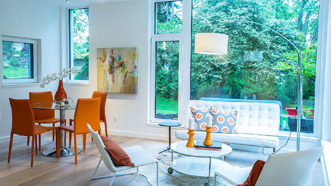 Because heat isn't constantly escaping, the Bernhardt Passive House relies on its big windows to make the sun the primary source of heat. Photo by Derek Ford. Because heat isn't constantly escaping, the Bernhardt Passive House relies on its big windows to make the sun the primary source of heat. Photo by Derek Ford.