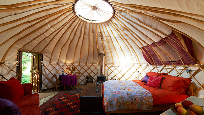 Image of the interior of a "glamping" yurt