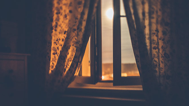 Image of a window open on a hot summer night