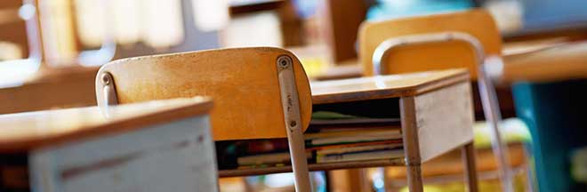 Desks in an elementary school classroom