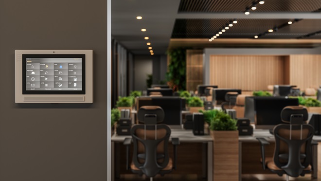 Smart control system with app icons on a digital screen in modern office