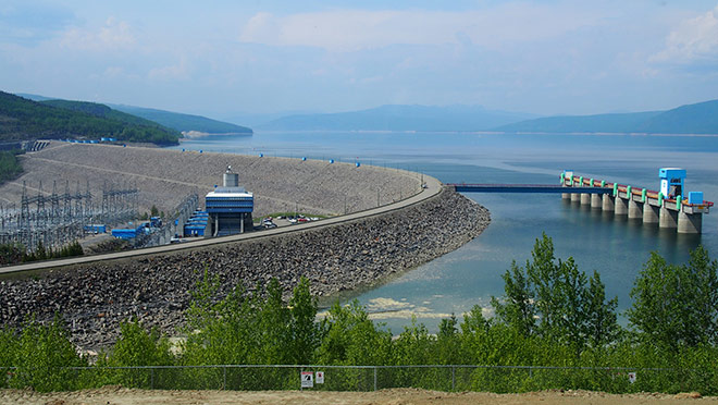 Image of the WAC Bennett Dam on a blue sky day Image of the WAC Bennett Dam on a blue sky day