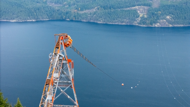 The last remaining conductor next to the parallel 230 kV power line. The 230 kV line will continue to supply power to Powell River and surrounding areas. 