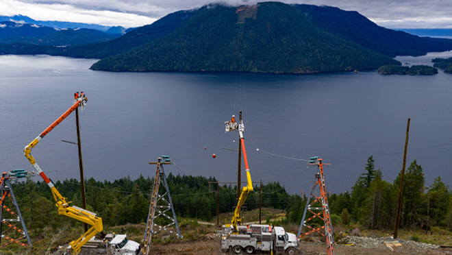 Crews construct the new bypass line at Saltery Bay.