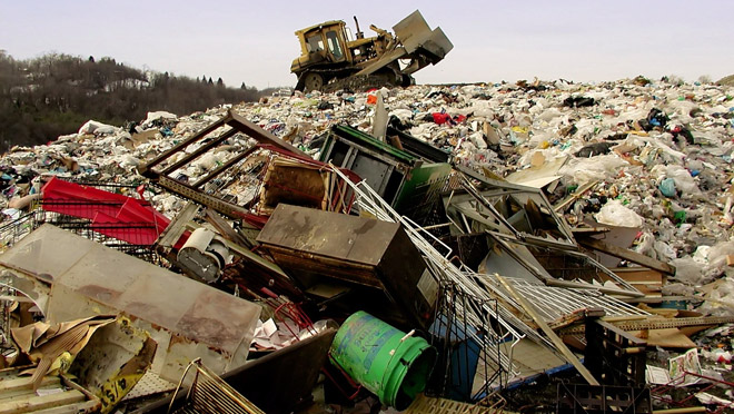 Image of bulldozer in a landfill Image of bulldozer in a landfill