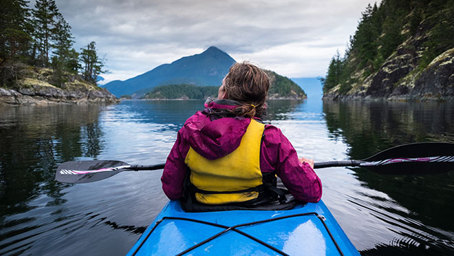 kayaking in Desolation sound Kayaker in Desolation Sound