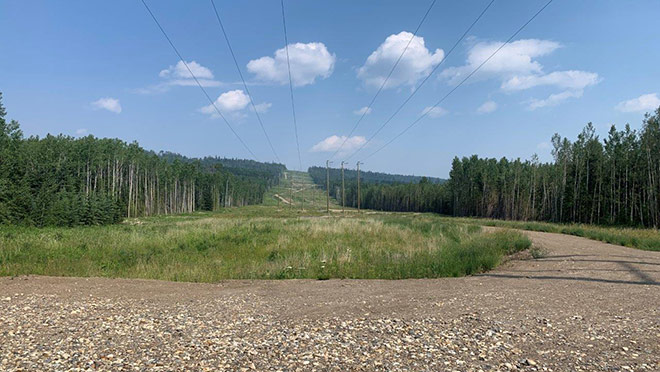 Electric power transmission lines over a remote area Electric power transmission lines over a remote area