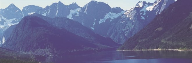 Jones Lake reservoir from South Shore Jones Lake showing craggy mountain peaks in the background