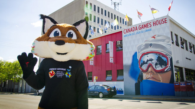 nanguz-mascot-canada-games-house-full-width-place.jpg 2015 Canada Games mascot Nanguz in front of Games headquarters in Prince George.