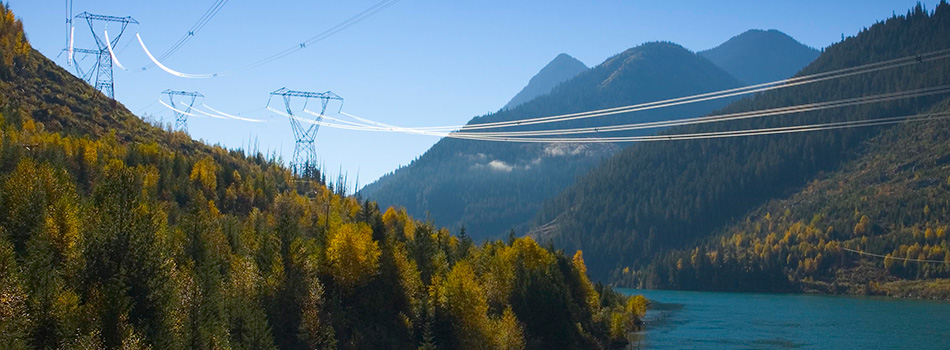 Transmission lines running over lake.