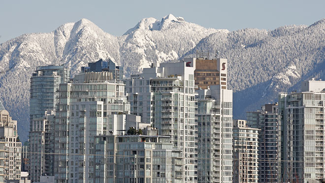 Image of downtown Vancouver skyline set against snowy North Shore backdrop Image of downtown Vancouver skyline set against snowy North Shore backdrop