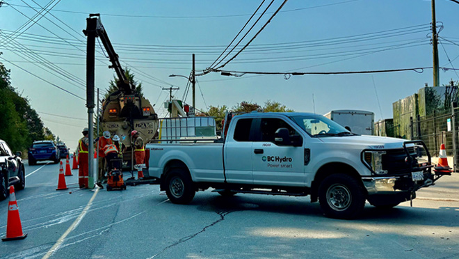 BC Hydro crew conduct investigative work along Interurban Road.