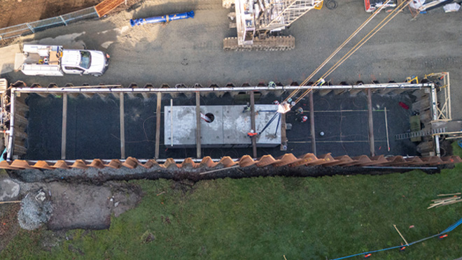 Aerial view of the placement of the concrete vault sections within Viaduct Park.