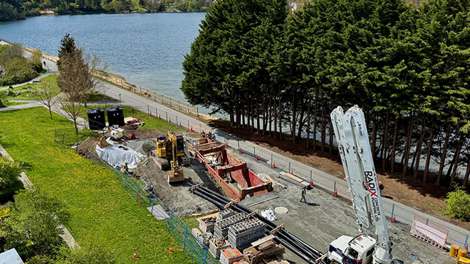 Construction work along a lakeside path in Viaduct Park in Victoria, B.C.