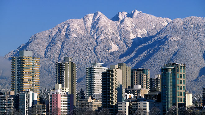 Image of Vancouver's West End and snow-capped North Shore mountains