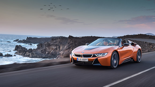 Image of a BMW i8 on a seaside road