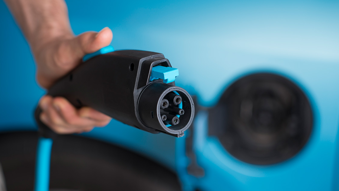 Electric vehicle plug closeup