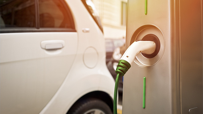 Image of charger and electric vehicle Image of charger and electric vehicle