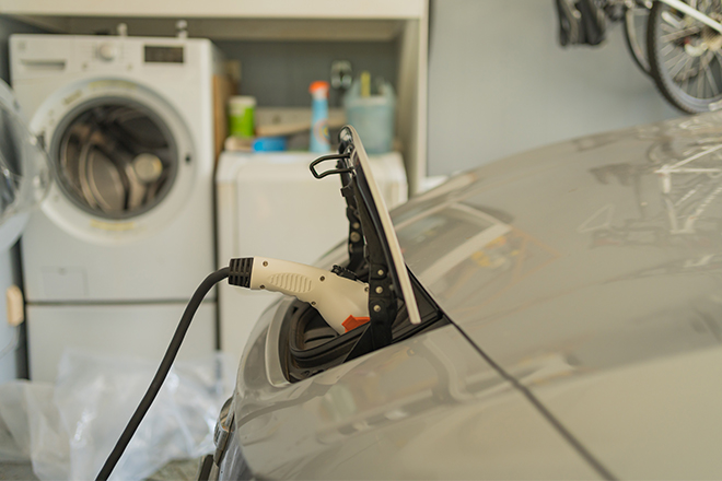 EV charging inside a home garage EV charging inside a home garage
