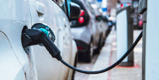 Image of EV charging on a city street