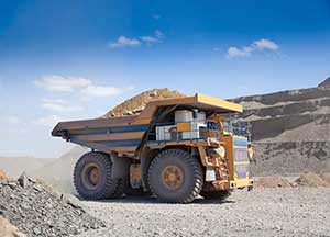 A heavy truck working in a strip mine A heavy truck working in a strip mine