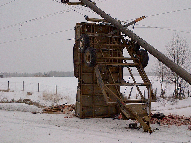 Car accident in the snow involving power pole Car accident in the snow involving power pole