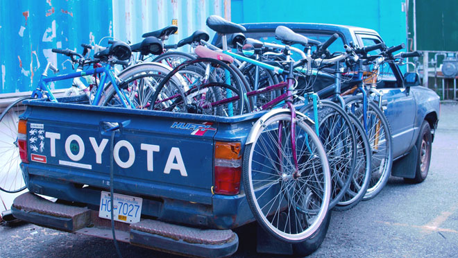 Image of pickup truck with bikes for PEDAL society Image of pickup truck with bikes for PEDAL society