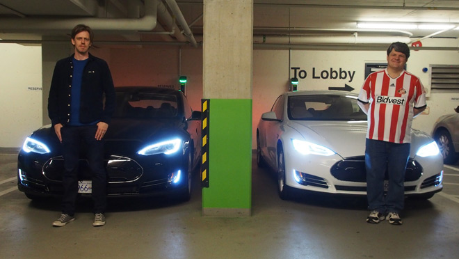 Image of Daryl Gates and Kevin Perry of Electronics Arts Canada with two Telsa Model S electric vehicles Image of Daryl Gates and Kevin Perry of Electronics Arts Canada with two Telsa Model S electric vehicles