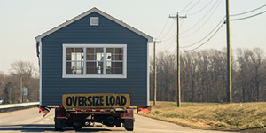 Vehicle transporting oversized load