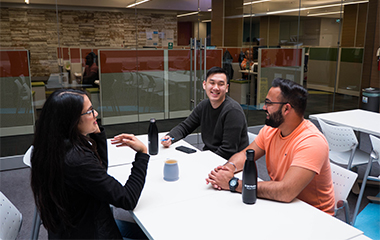 Photo of employees in the customer service centre kitchen