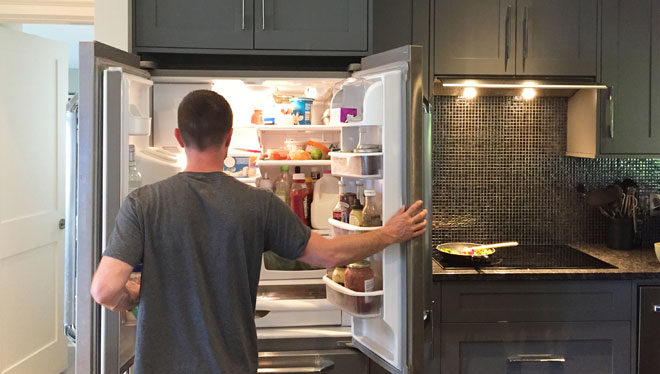 Man looking in fridge Man looking in fridge