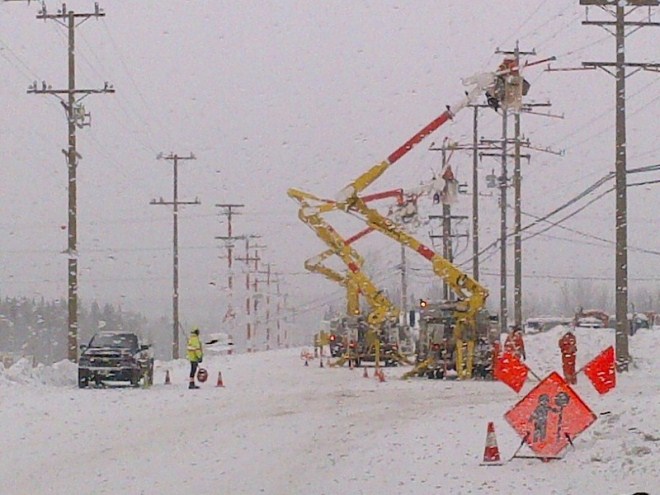 BC Hydro bucket crew work on powerlines near Smithers