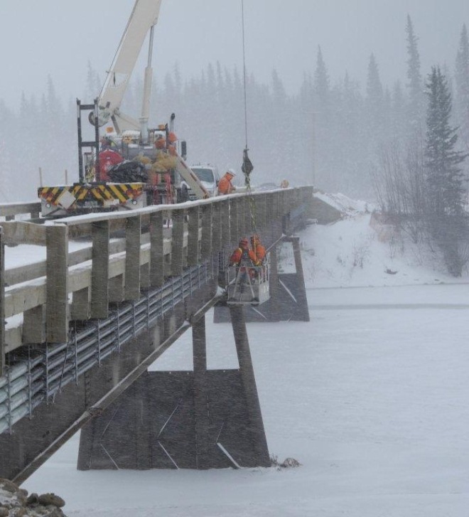 BC Hydro crews hang cables near Kwadacha