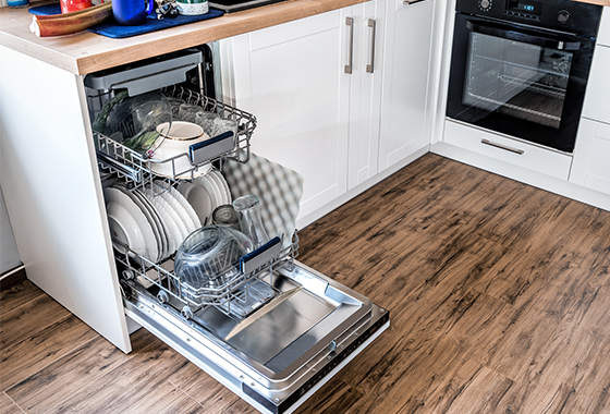 A dishwasher with open door