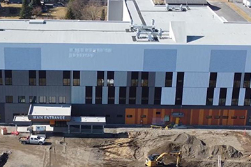 Aerial view of the new Mills Memorial Hospital and its surrounding construction