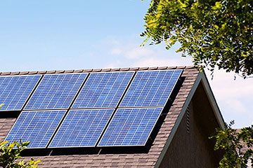 Solar panels on a gabled roof of a house