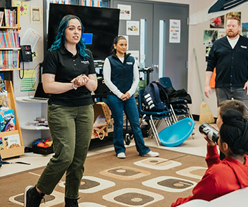 BC Hydro youth education manager, Nicole Viera, speaking in a school classroom