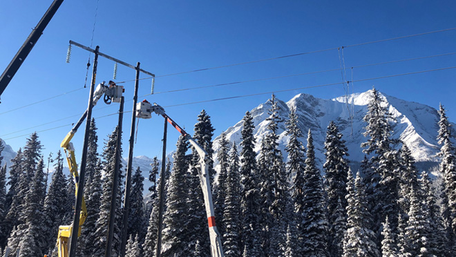 BC Hydro crews working on a transmission line north of Elkford.
