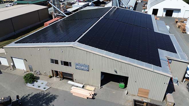 Canadian Bavarian Millwork + Lumber exterior with solar panels.
